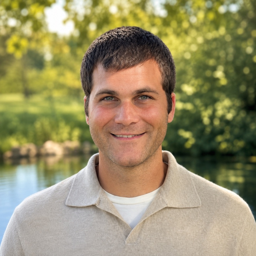 Jacob Huber outdoors by the water